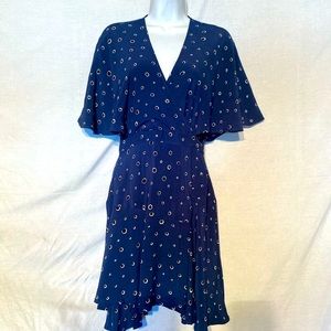 Faithfull the brand v neck polkat dot flutter sleeve ni navy blue.